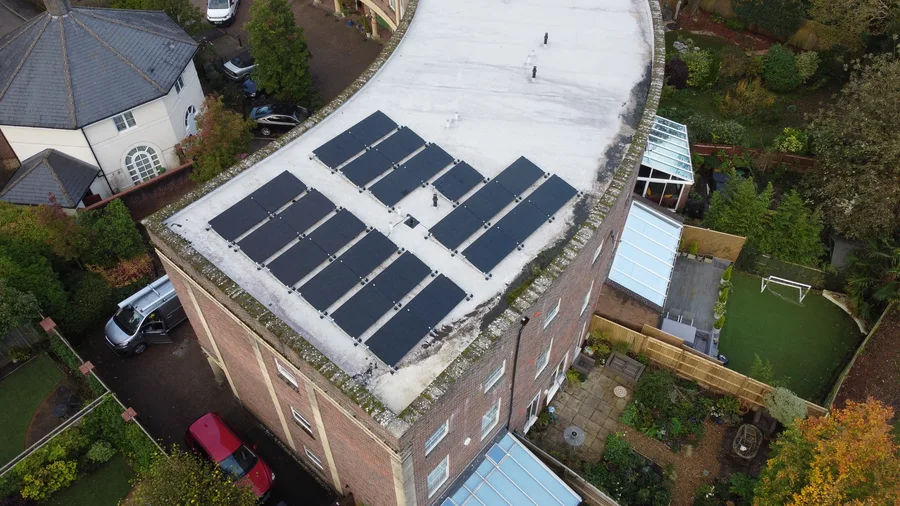 Solar panels on flat roof building